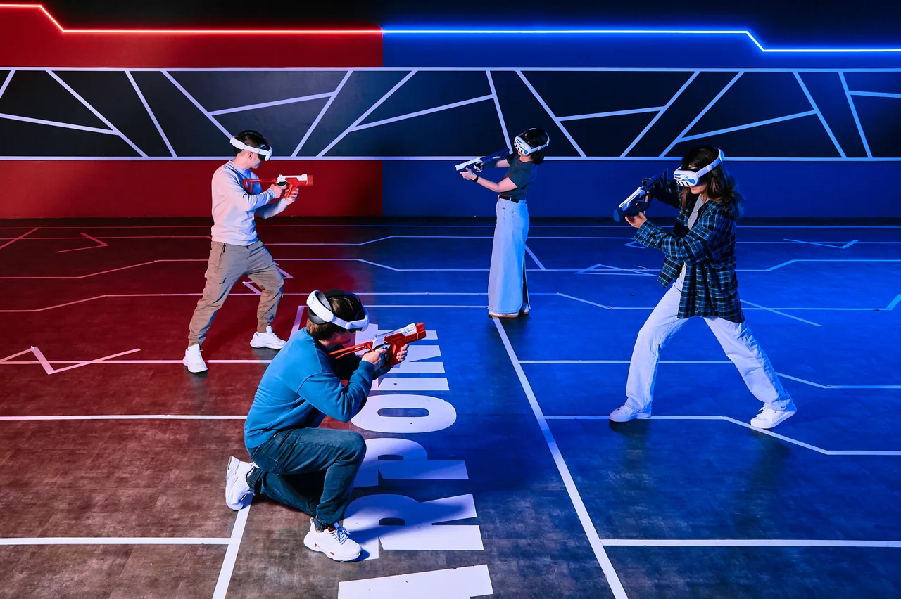 Team battle on the red and blue floor: a player shooting from one knee